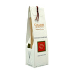 Diffuseur de parfum d'intérieur Fleur de Santal avec packaging blanc et oranges et tiges en rotin